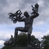 A man being attacked by flying babies