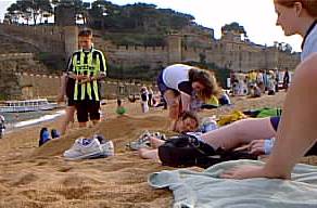 Amy being buried by others.